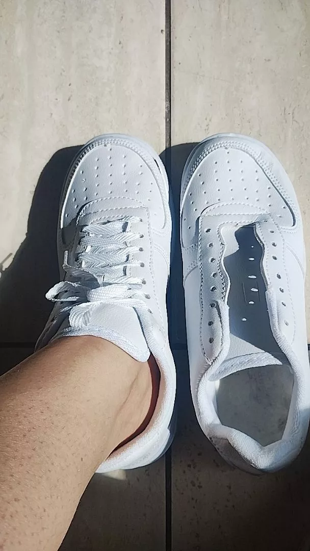 Foto de cliente 7 — Tênis Confortável Retrô